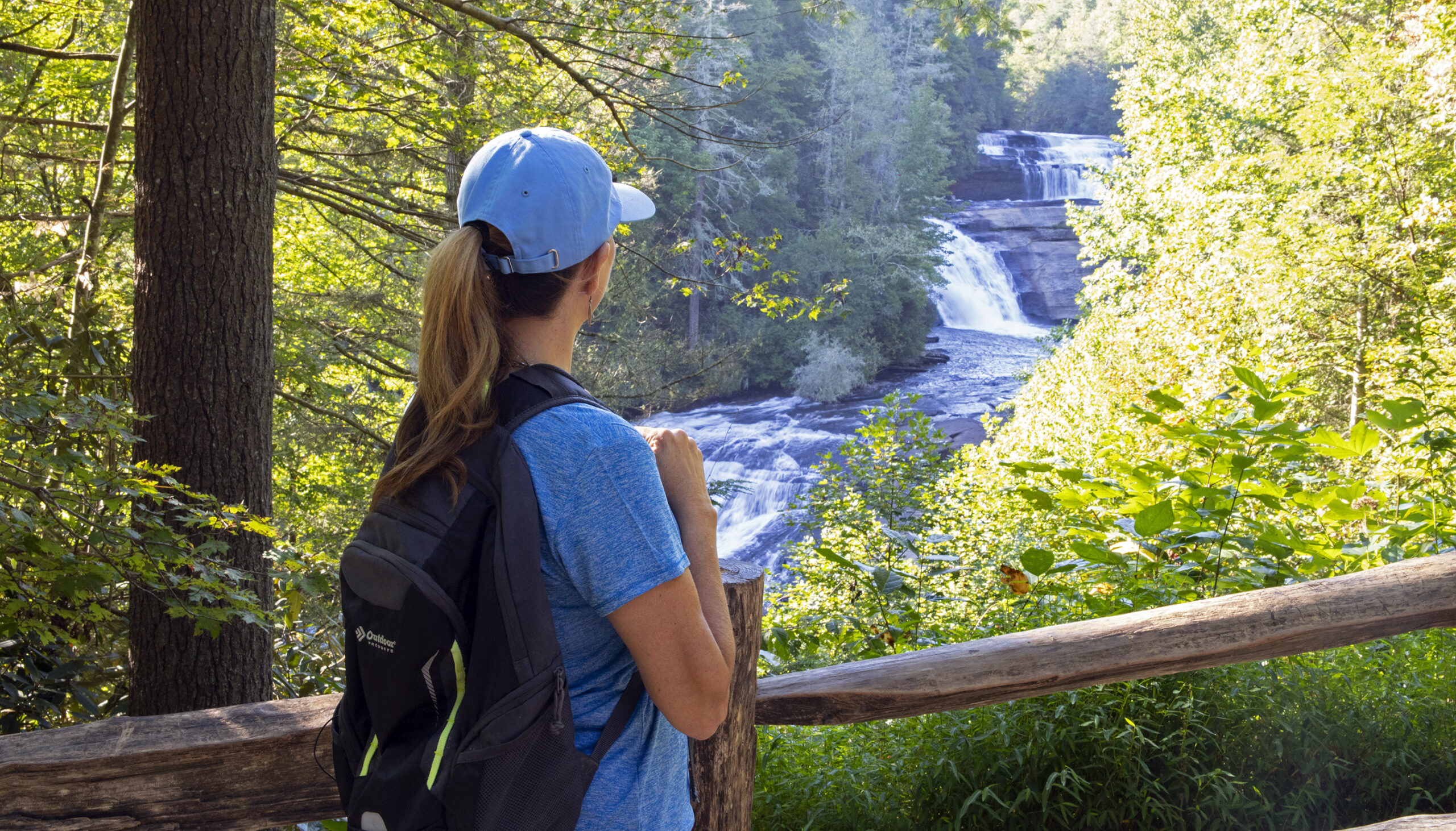 Dupont Forest hike woman looking at waterfall