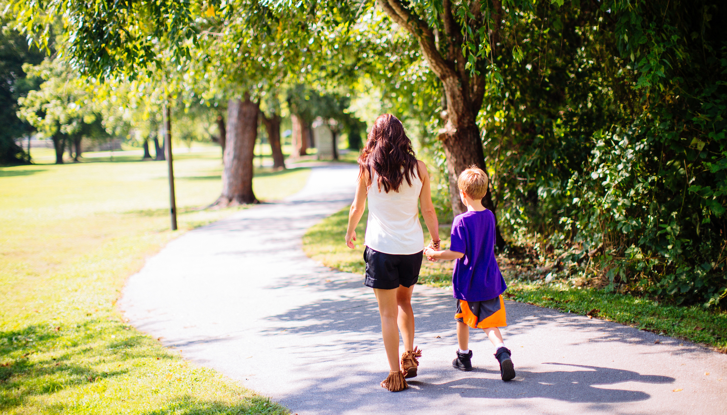 Oklawaha Greenway mother and son walking on oklawaha greenway